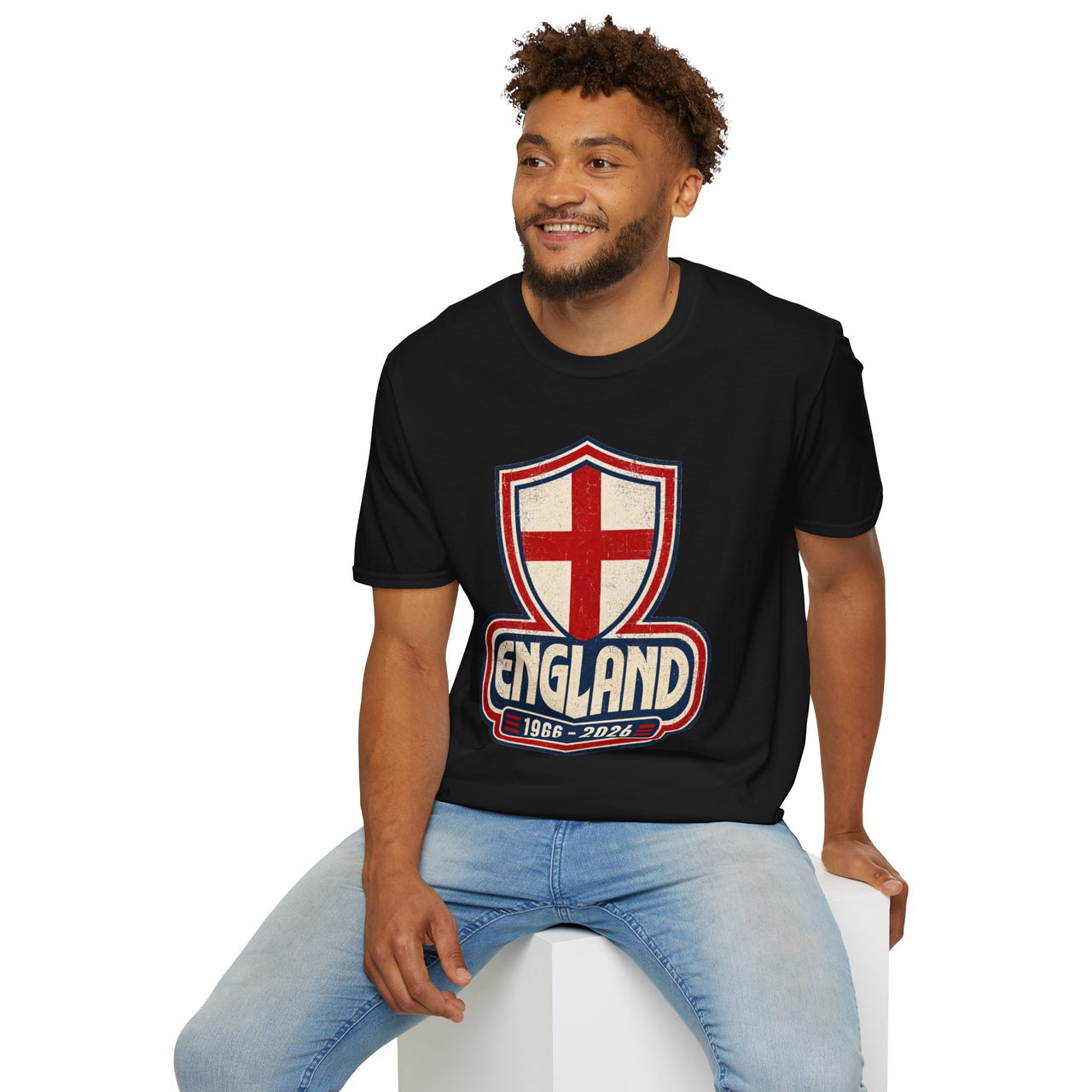 Man wearing a black t-shirt with an England logo on a white background