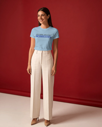 Thumbnail for Woman wearing a light blue t-shirt and beige pants against a red background - Good Morning That’s A Nice TNETENNBA - The IT Crowd T-Shirt