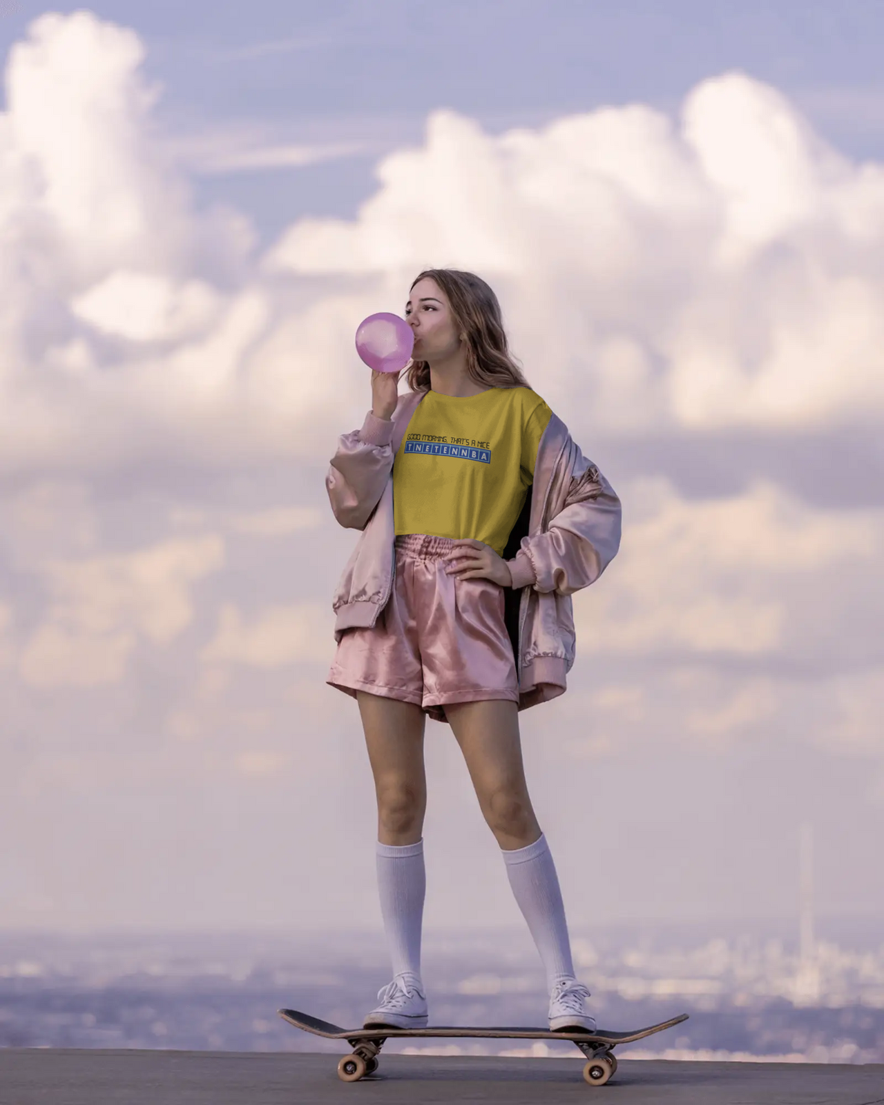 Person skateboarding with a colorful outfit against a cloudy sky. - IT Crowd - Tnetennba