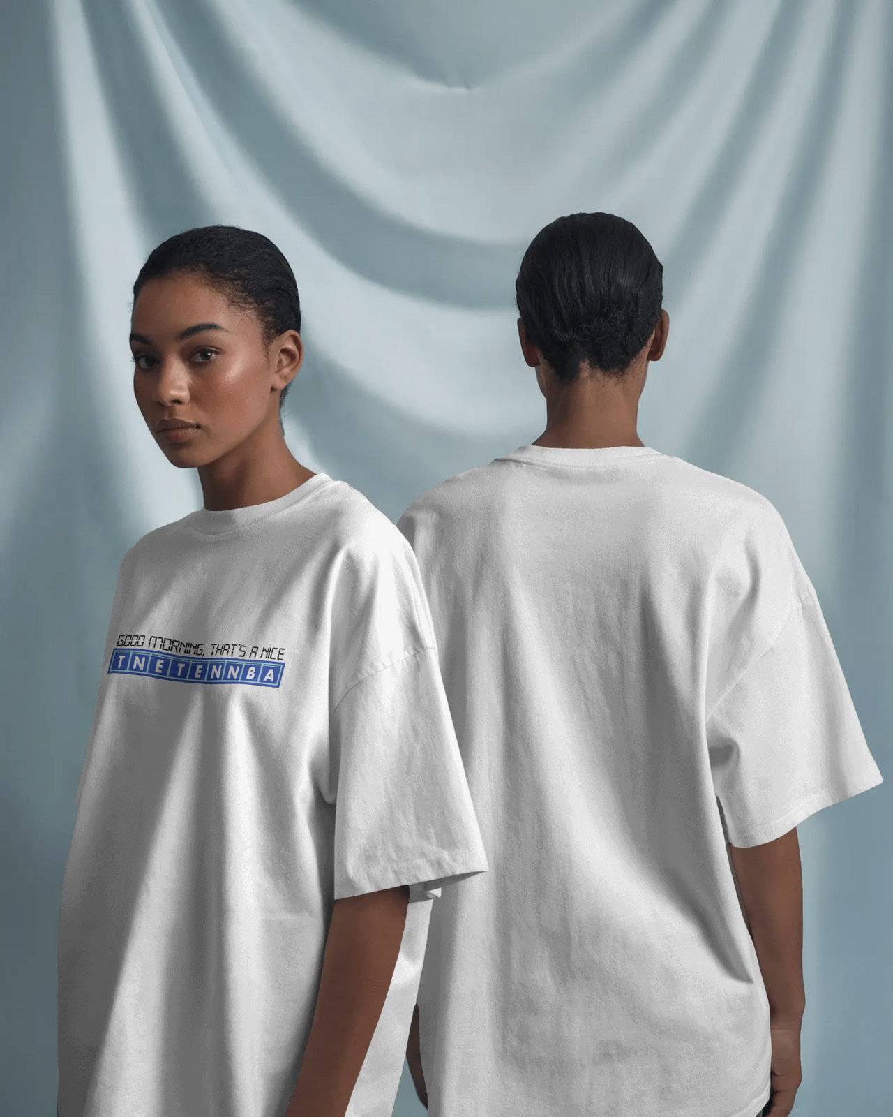 Person wearing a white t-shirt with text, facing front and back, on a light gray background - IT Crowd - Tnetennba