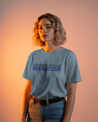 Thumbnail for Light Blue - IT Crowd - Tnetennba t-shirt in a studio with dramatic lighting