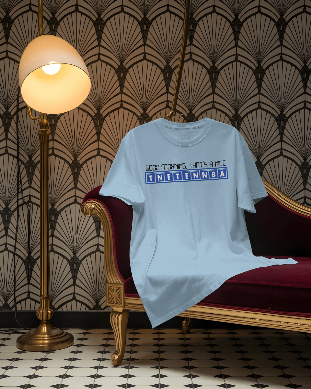 Light blue t-shirt with text on a red and gold ornate chair with decorative wall and floor. - IT Crowd - Tnetennba