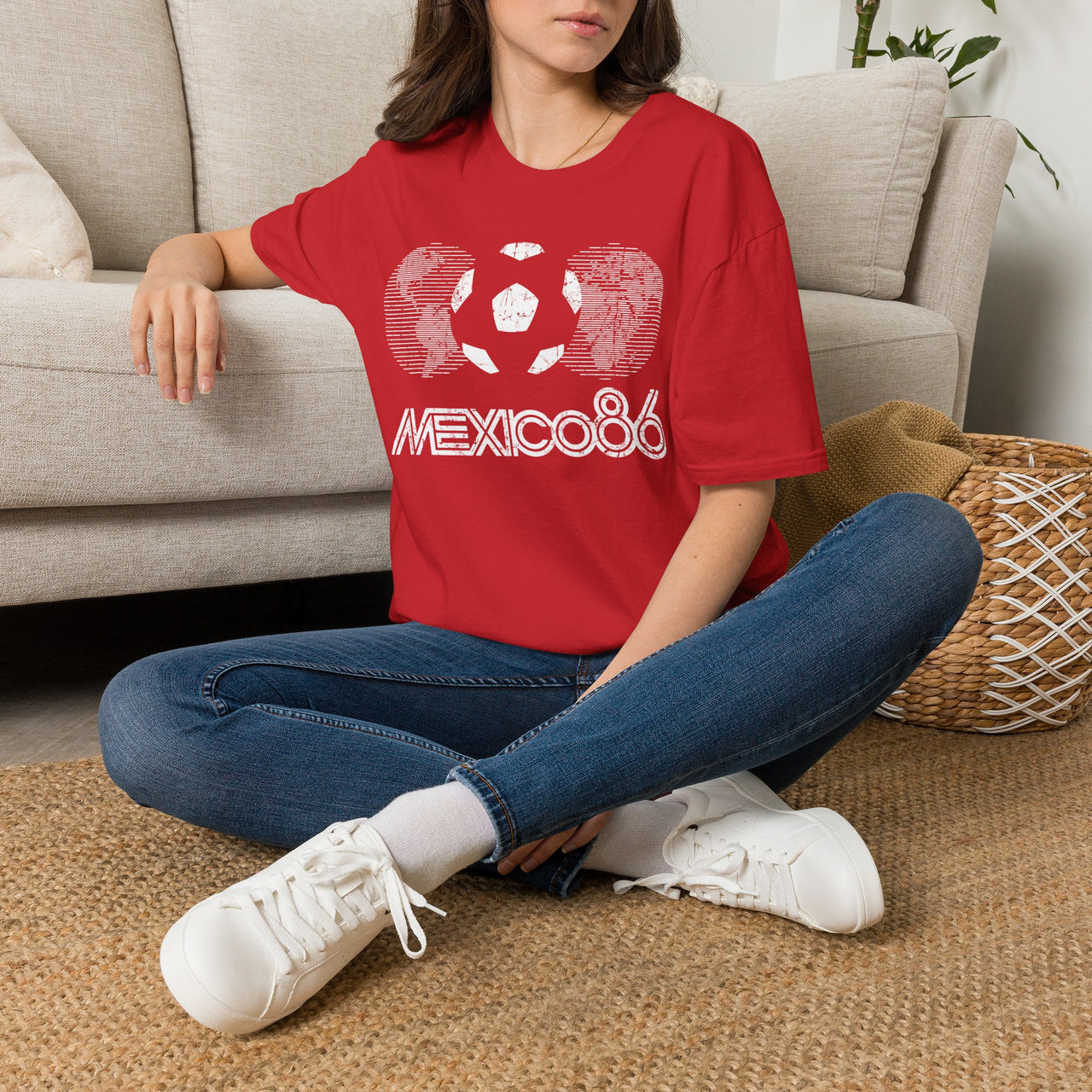 Person wearing a red 'Mexico 86' t-shirt sitting on the floor. Vintage World Cup