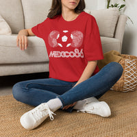 Thumbnail for Person wearing a red 'Mexico 86' t-shirt sitting on the floor. Vintage World Cup