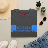 Thumbnail for A folded dark gray heather graphic T-shirt is arranged in a styled flat lay on a light beige surface. The shirt features a blue and gray 'BASS THE FINAL FRONTIER' design across the chest and a small red neck label reading 'DEMON VENT'.
