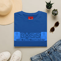 Thumbnail for A folded royal blue T-shirt with a large light blue 'BASS THE FINAL FRONTIER' graphic across the chest, styled in a flat lay with a straw hat, white sneakers, blue jeans, sunglasses, and small potted succulents on a light beige background.