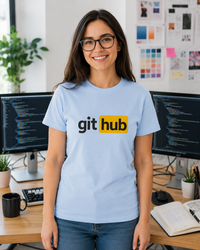 Thumbnail for Git Hub developer humour t-shirt in light blue worn in a coding workspace