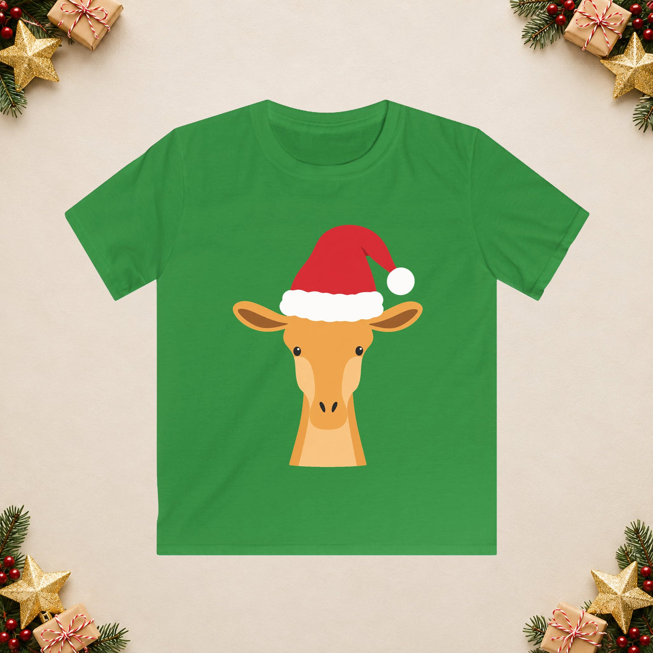 Santa giraffe Christmas kids t shirt in Irish Green, front view with the Santa animal illustration on a Christmas flat-lay background.