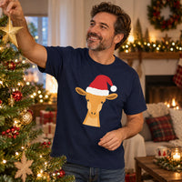 Thumbnail for Santa Giraffe Christmas Unisex T-Shirt in Navy, worn in a Christmas home setting with the Santa giraffe front print visible.