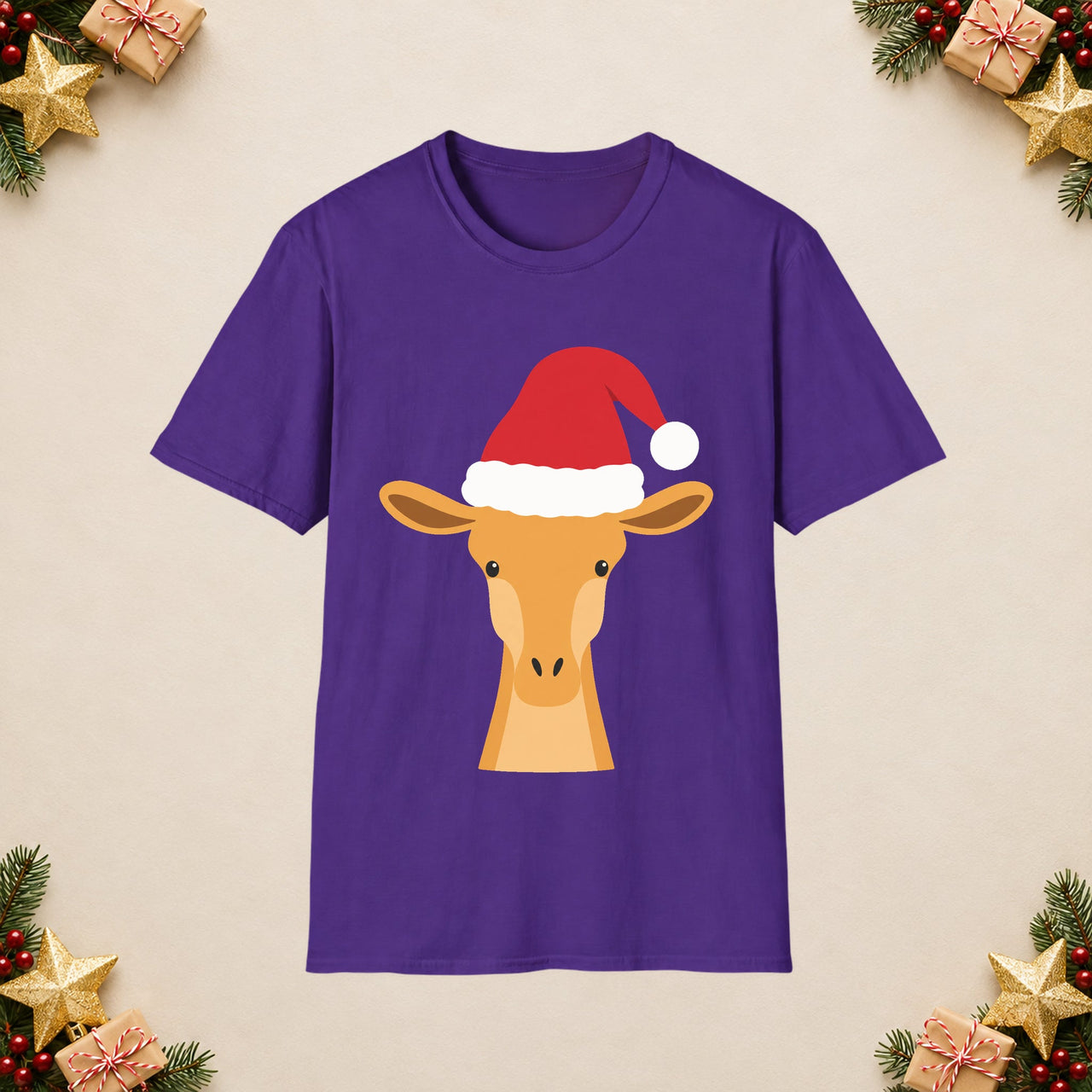 Santa giraffe Christmas unisex t shirt in Purple, front view with the Santa animal illustration on a Christmas flat-lay background.
