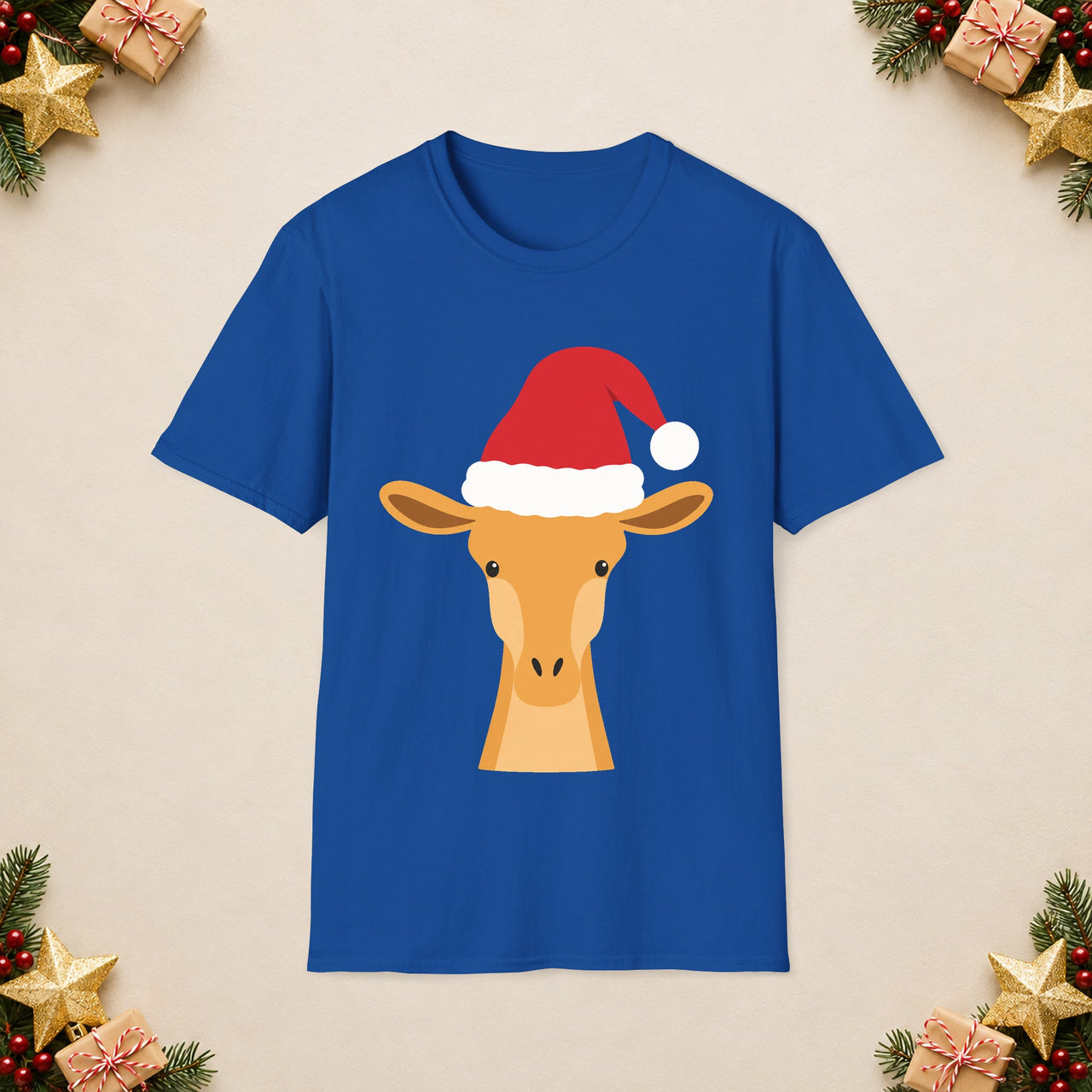 Santa giraffe Christmas unisex t shirt in Royal, front view with the Santa animal illustration on a Christmas flat-lay background.