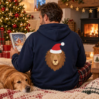 Thumbnail for Santa Lion Christmas Back Print Hoodie in Navy, worn in a Christmas home setting with the Santa lion back print visible.