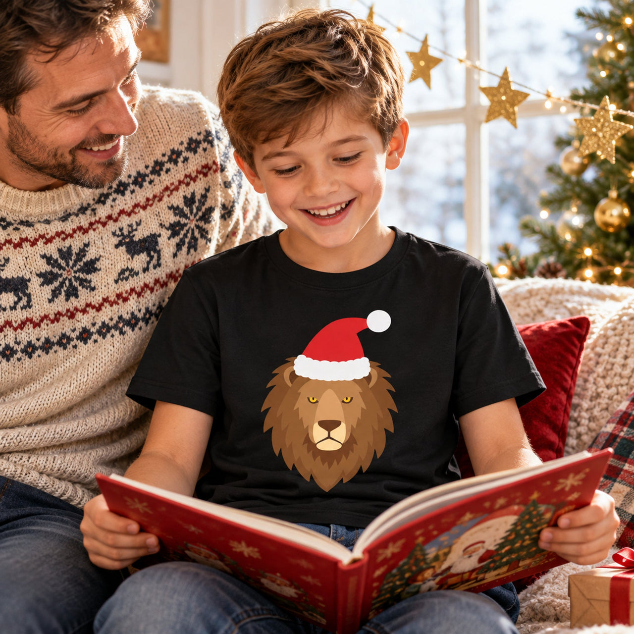 Santa Lion Christmas Kids T-Shirt in Black, worn in a Christmas home setting with the Santa lion front print visible.