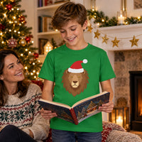 Thumbnail for Santa Lion Christmas Kids T-Shirt in Irish Green, worn in a Christmas home setting with the Santa lion front print visible.