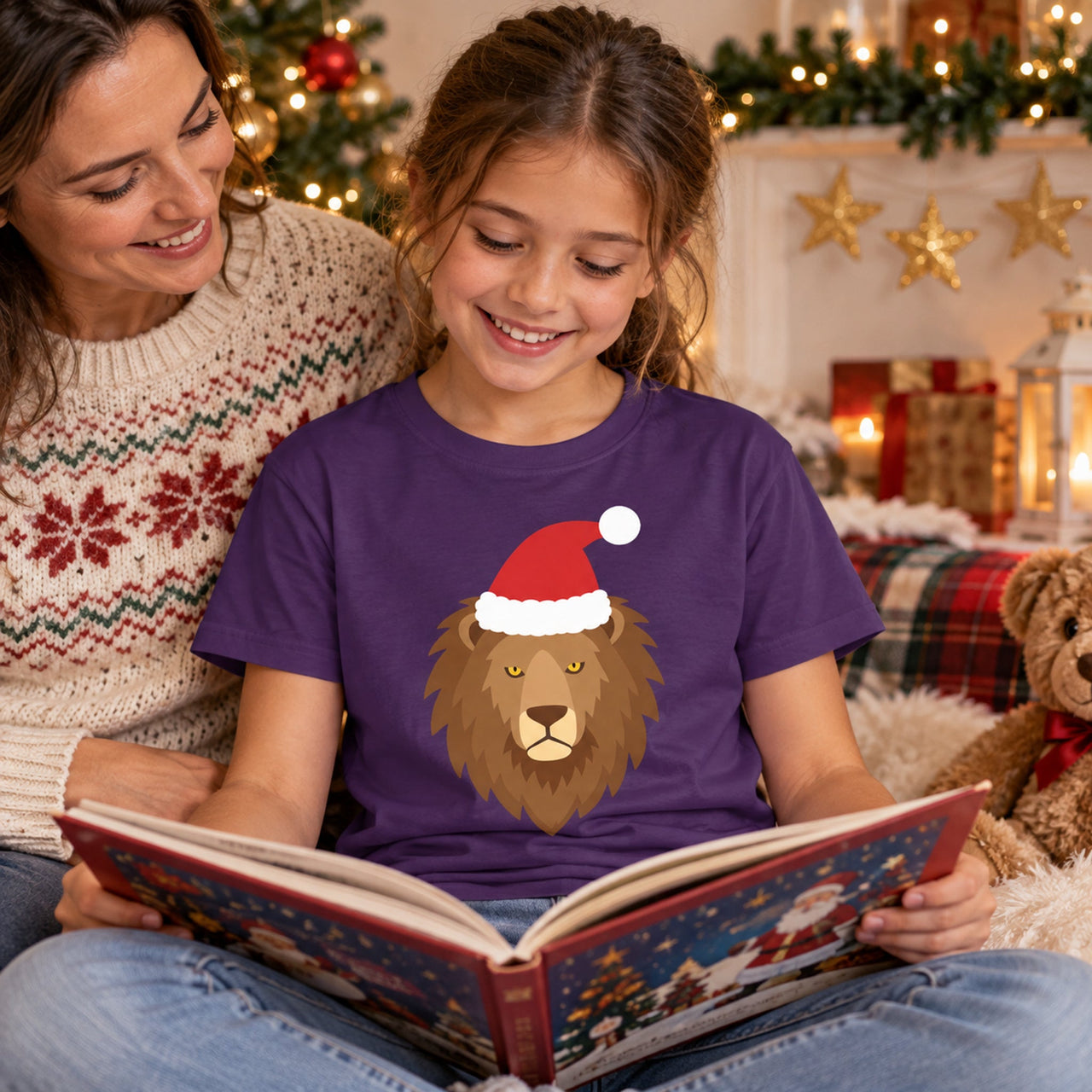 Santa Lion Christmas Kids T-Shirt in Purple, worn in a Christmas home setting with the Santa lion front print visible.