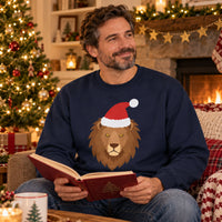 Thumbnail for Santa Lion Christmas Sweatshirt in Navy, worn in a Christmas home setting with the Santa lion front print visible.