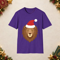 Thumbnail for Santa lion Christmas unisex t shirt in Purple, front view with the Santa animal illustration on a Christmas flat-lay background.