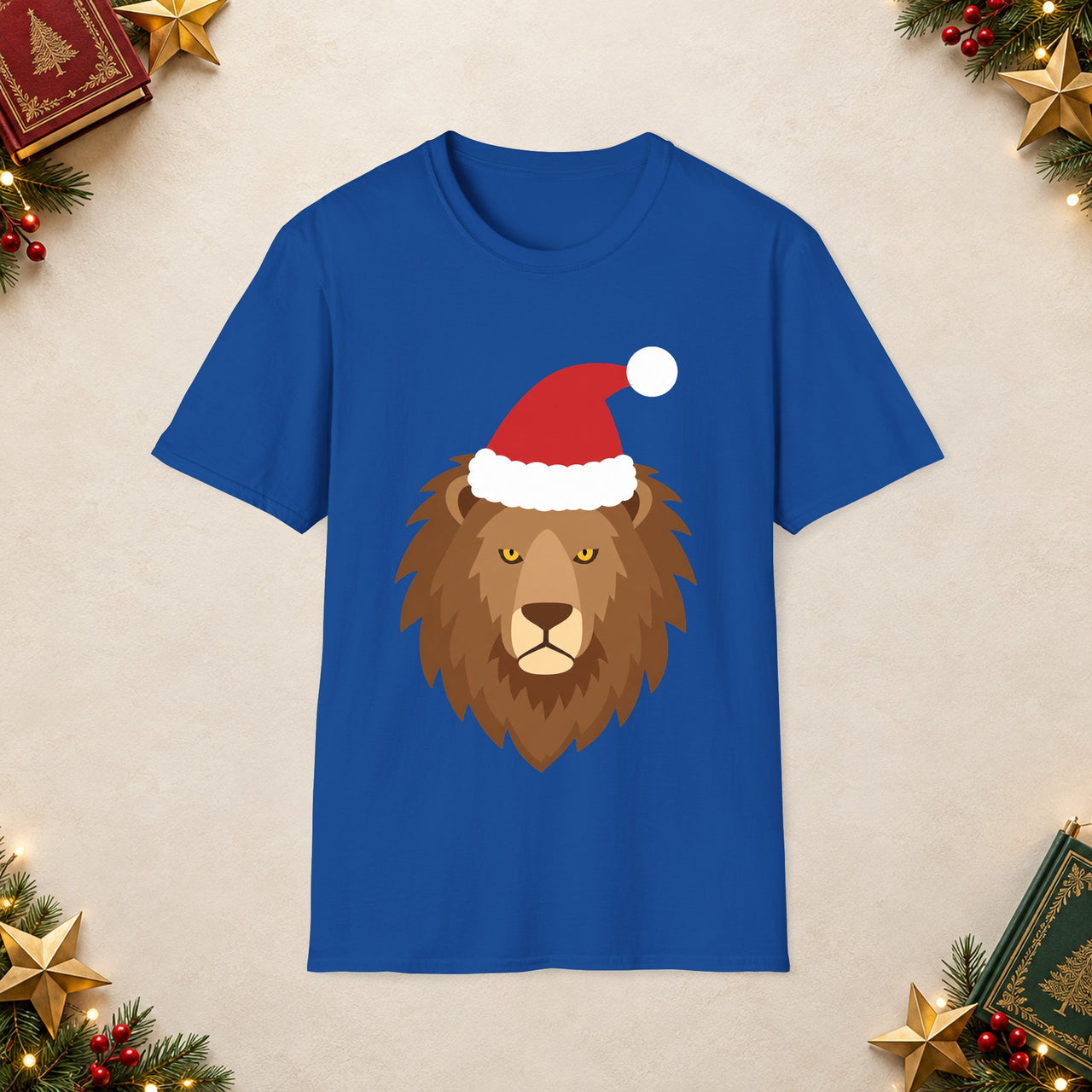 Santa lion Christmas unisex t shirt in Royal, front view with the Santa animal illustration on a Christmas flat-lay background.