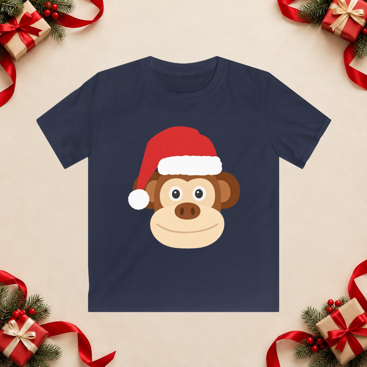 Santa monkey Christmas kids t shirt in Navy, front view with the Santa animal illustration on a Christmas flat-lay background.