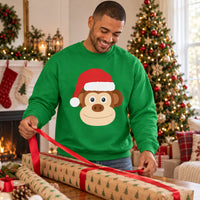 Thumbnail for Santa Monkey Christmas Sweatshirt in Irish Green, worn in a Christmas home setting with the Santa monkey front print visible.
