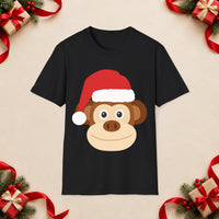 Thumbnail for Santa monkey Christmas unisex t shirt in Black, front view with the Santa animal illustration on a Christmas flat-lay background.