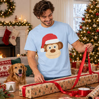 Thumbnail for Santa Monkey Christmas Unisex T-Shirt in Light Blue, worn in a Christmas home setting with the Santa monkey front print visible.