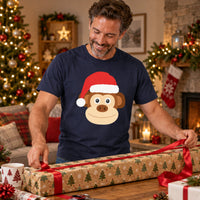 Thumbnail for Santa Monkey Christmas Unisex T-Shirt in Navy, worn in a Christmas home setting with the Santa monkey front print visible.