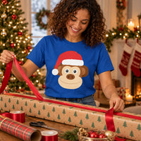 Thumbnail for Santa Monkey Christmas Unisex T-Shirt in Royal, worn in a Christmas home setting with the Santa monkey front print visible.