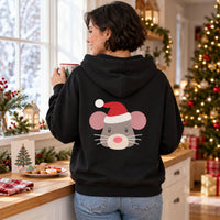 Thumbnail for Santa Mouse Christmas Back Print Hoodie in Black, worn in a Christmas home setting with the Santa mouse back print visible.
