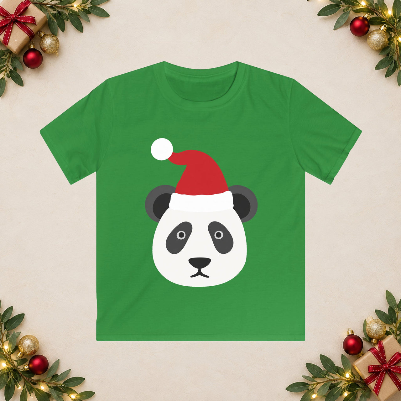 Santa panda Christmas kids t shirt in Irish Green, front view with the Santa animal illustration on a Christmas flat-lay background.