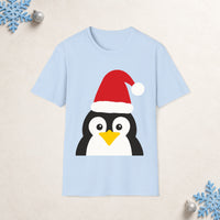 Thumbnail for Santa penguin Christmas unisex t shirt in Light Blue, front view with the Santa animal illustration on a Christmas flat-lay background.