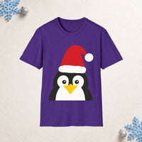 Thumbnail for Santa penguin Christmas unisex t shirt in Purple, front view with the Santa animal illustration on a Christmas flat-lay background.