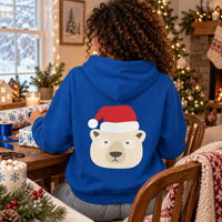 Thumbnail for Santa Polar Bear Christmas back print hoodie in Royal, worn in a Christmas home setting with the Santa polar bear back print visible.