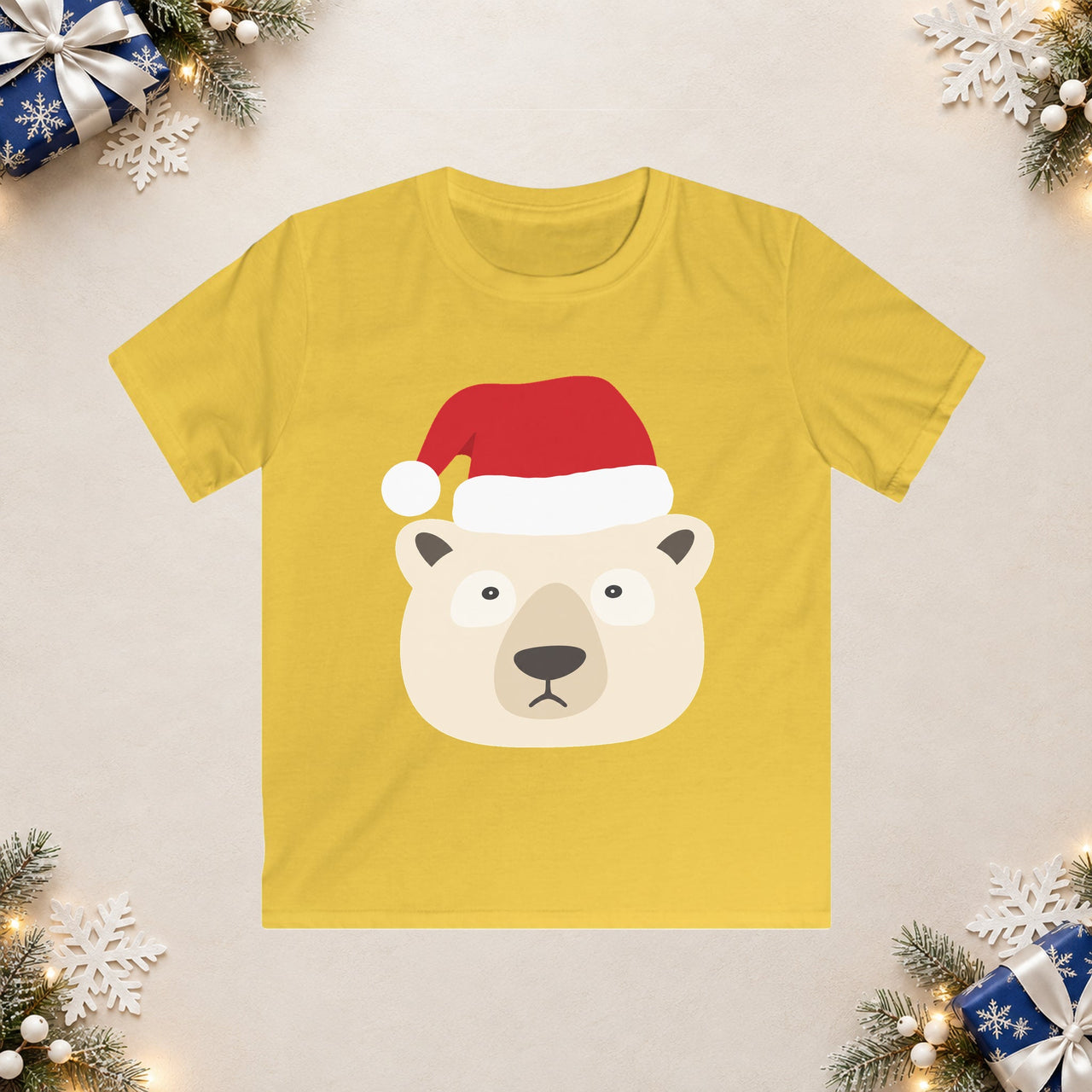 Santa polar bear Christmas kids t shirt in Daisy, front view with the Santa animal illustration on a Christmas flat-lay background.