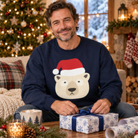 Thumbnail for Santa Polar Bear Christmas sweatshirt in Navy, worn in a Christmas home setting with the Santa polar bear front print visible.