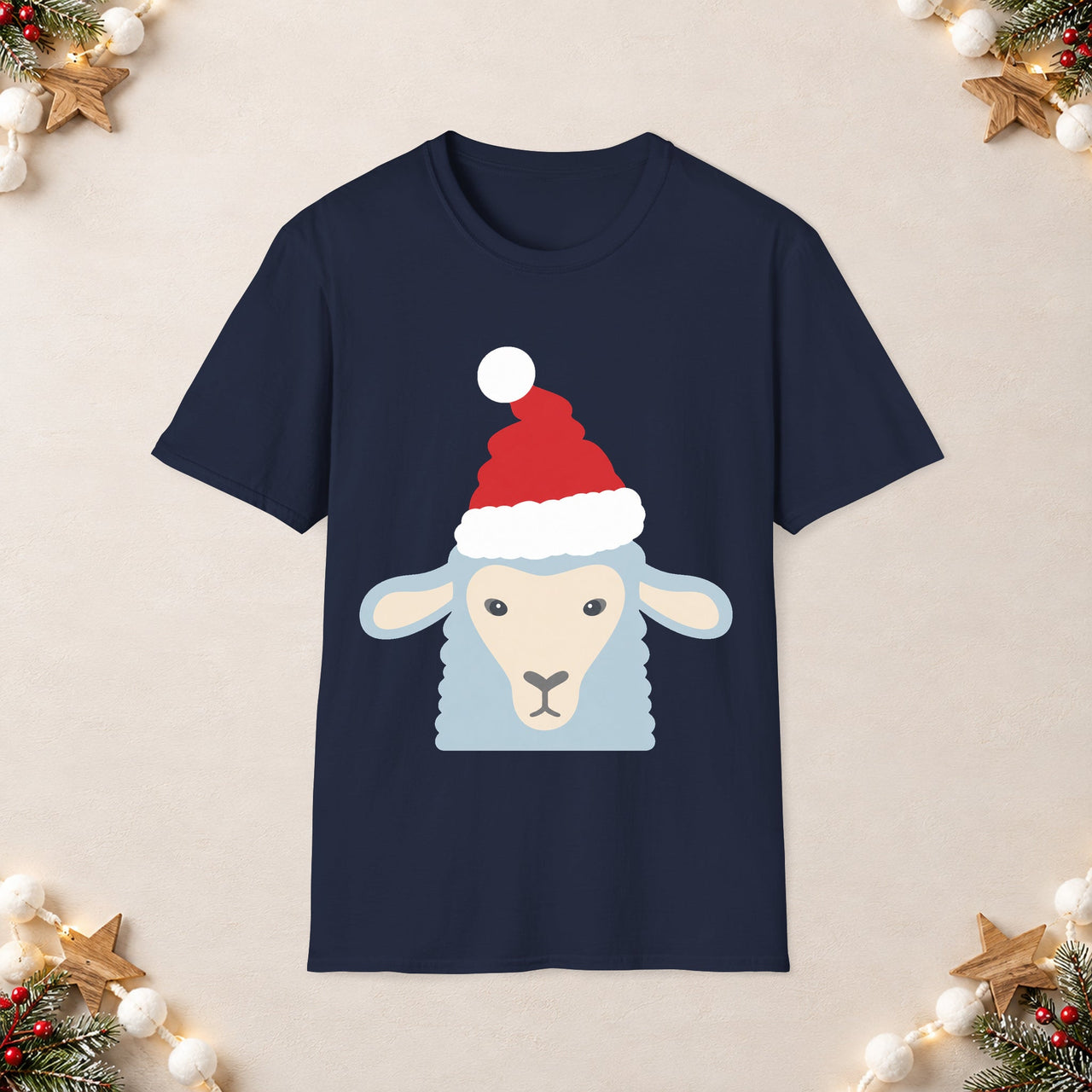 Santa sheep Christmas unisex t shirt in Navy, front view with the Santa animal illustration on a Christmas flat-lay background.