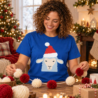 Thumbnail for Santa Sheep Christmas Unisex T-Shirt in Royal, worn in a Christmas home setting with the Santa sheep front print visible.