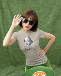 Thumbnail for Shakespeare So Lit women’s fitted t-shirt in Sand, styled with sunglasses against a soft green backdrop